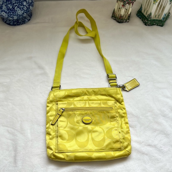 Coach Handbags - Coach Getaway Signature Nylon File Bag